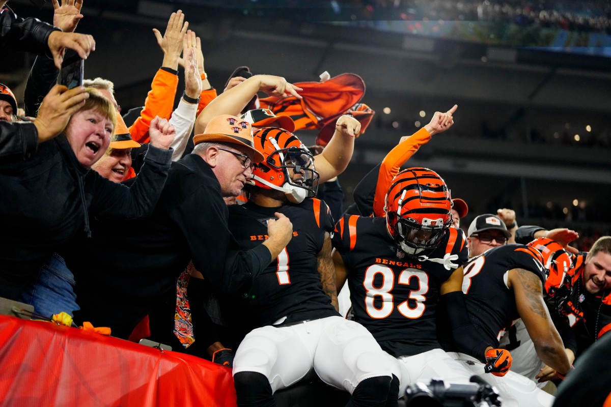 Cincinnati Bengals wide receiver Ja'Marr Chase (1) and wide receiver Tyler Boyd (83) celebrate a touchdown reception by Boyd in the first quarter of the NFL Week 17 game between the Cincinnati Bengals and the Buffalo Bills at Paycor Stadium in Downtown Cincinnati on Monday, Jan. 2, 2023. The game was suspended with suspended in the first quarter after Buffalo Bills safety Damar Hamlin (3) was taken away in an ambulance following a play. Buffalo Bills At Cincinnati Bengals Week 17